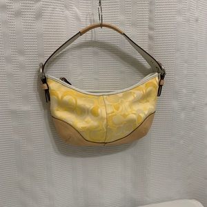 Coach Yellow Canvas and Tan leather trim handbag.